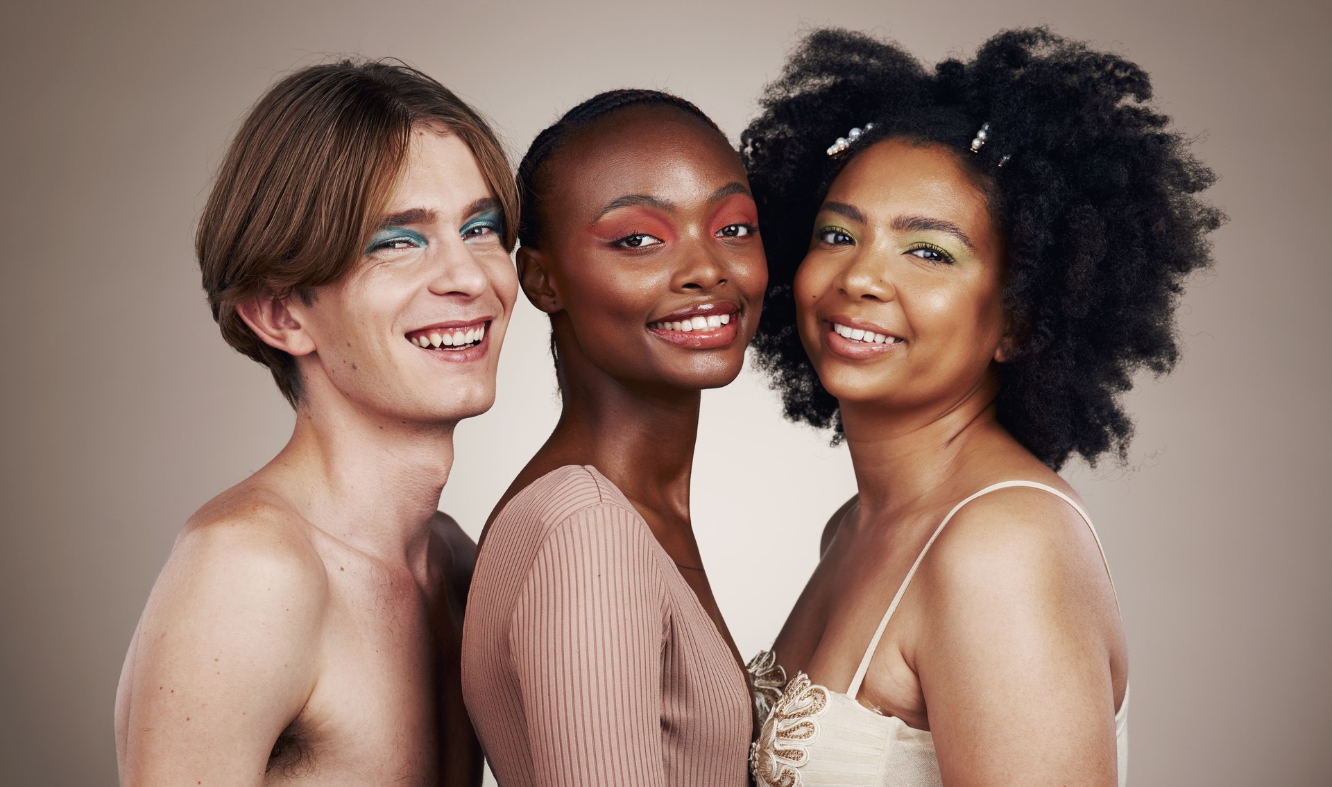Diversity, beauty and skin, portrait and happy people, dermatology and inclusion isolated on studio background. Gen z, young women and man with face, equality and cosmetics with skincare and wellness